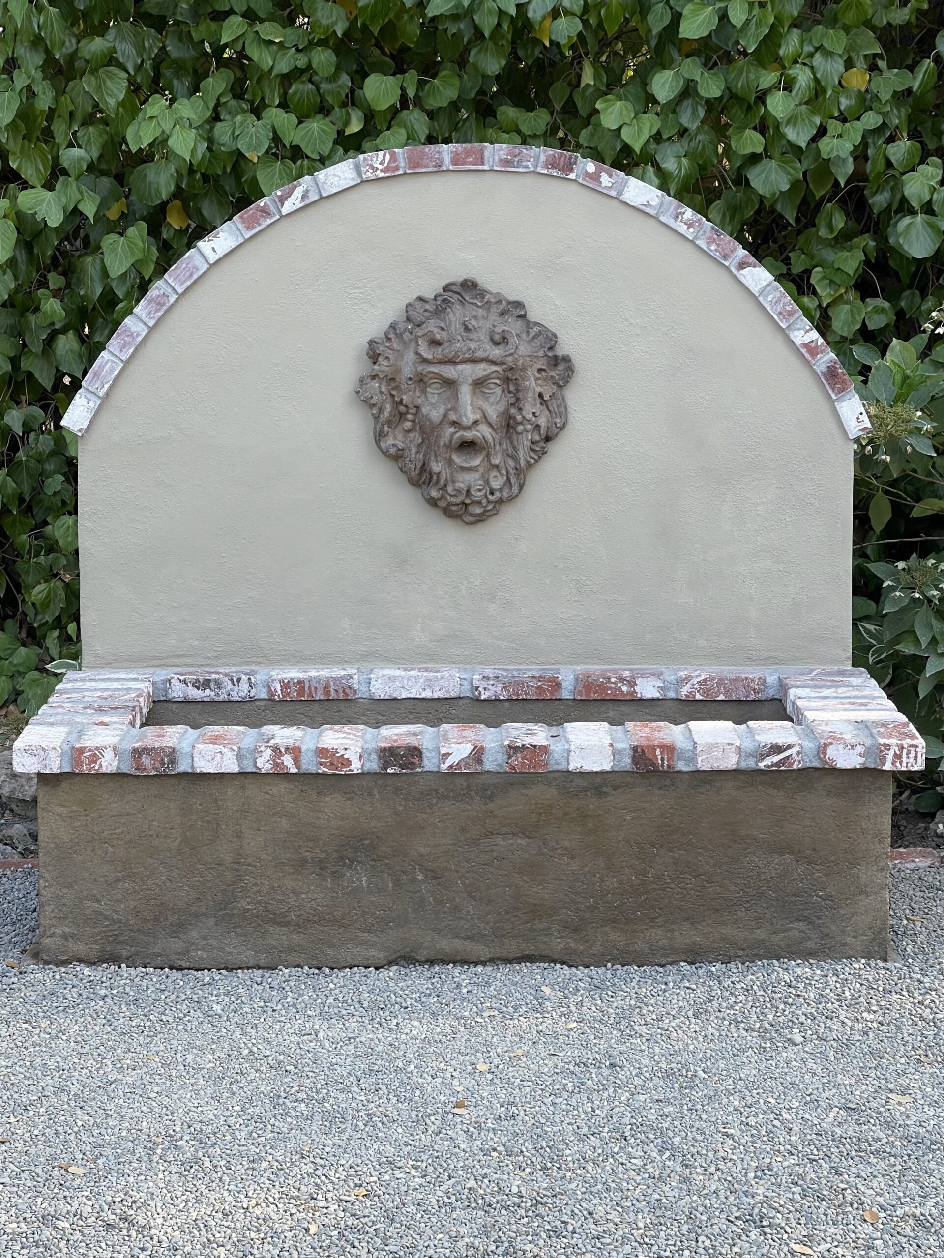 The concrete wall fountain after the application of Cumin Antiquing stain and sealed with EasySeal for added protection and durability.