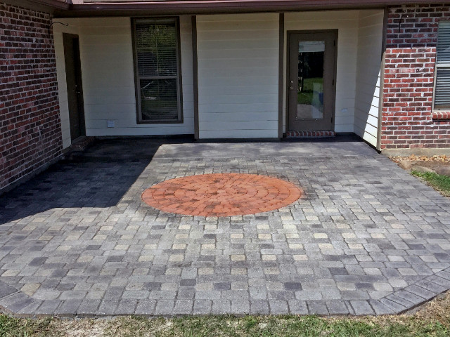 Terra Cotta & Charcoal Portico Stains on Patio Concrete Pavers