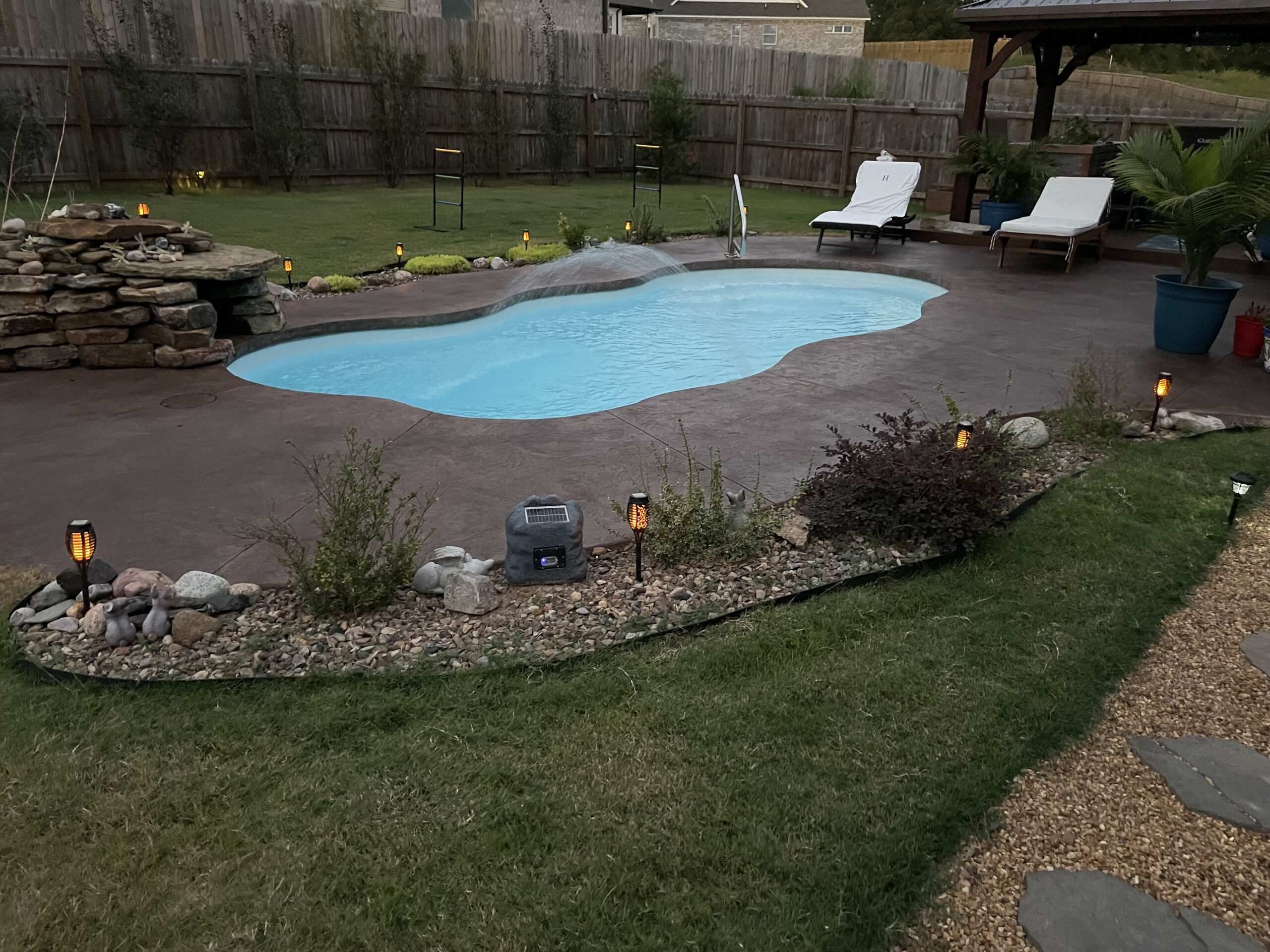 antiquing-aztec-brown-stained-sealed-pool-deck Stained and sealed broomed concrete pool deck with aztec brown Antiquing and EasySeal