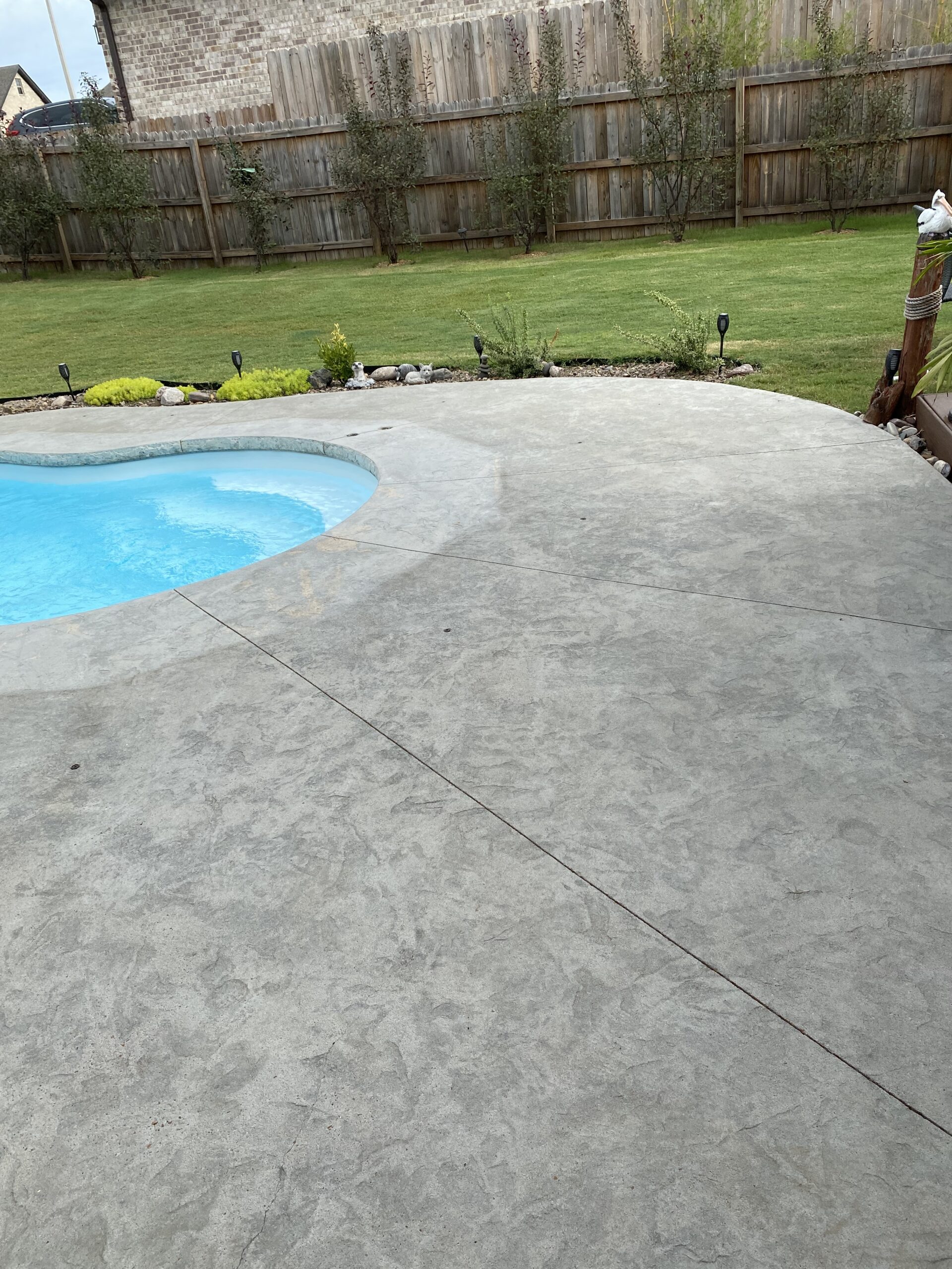 Broomed concrete pool deck