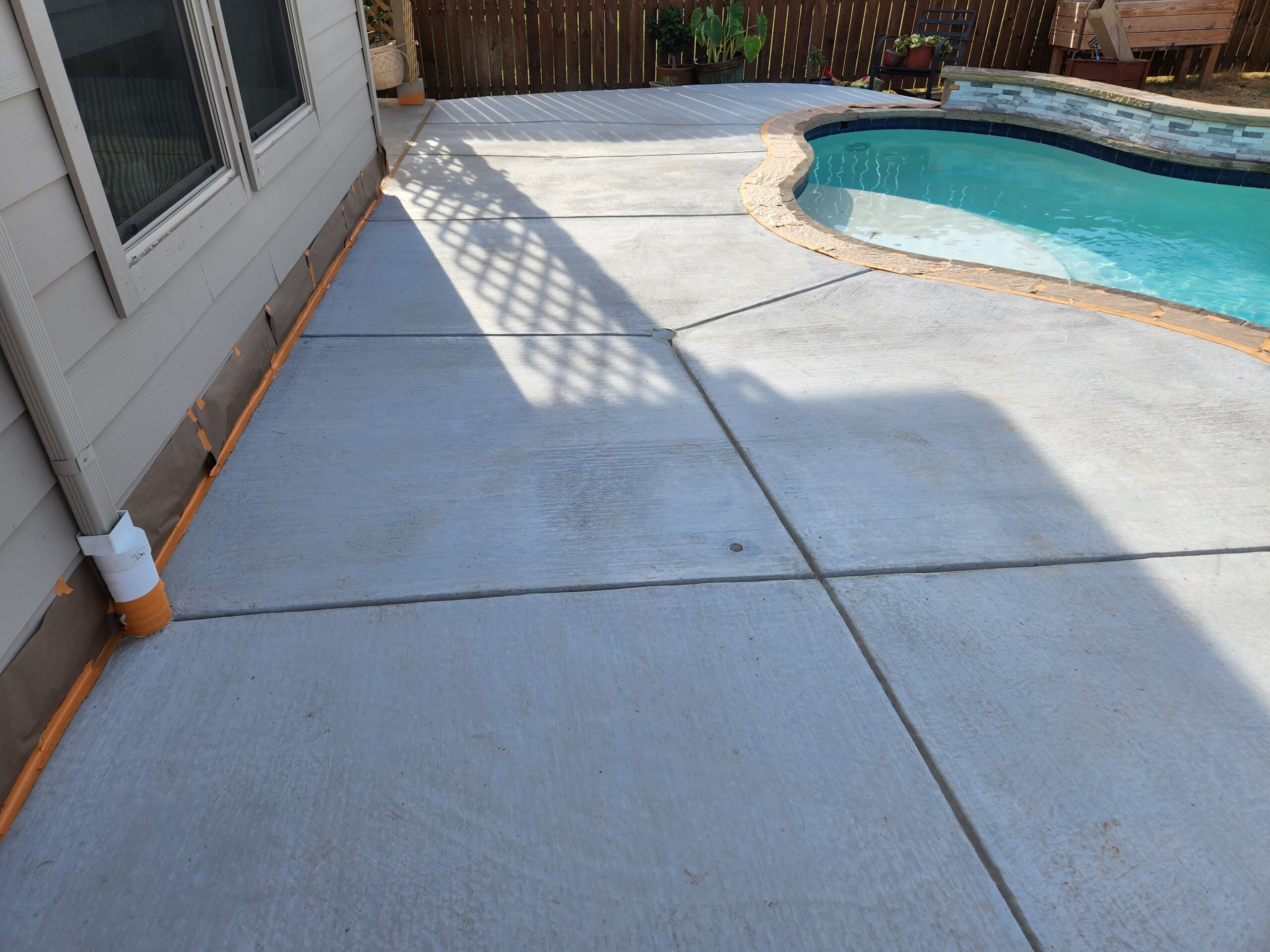 Newly poured concrete pool deck