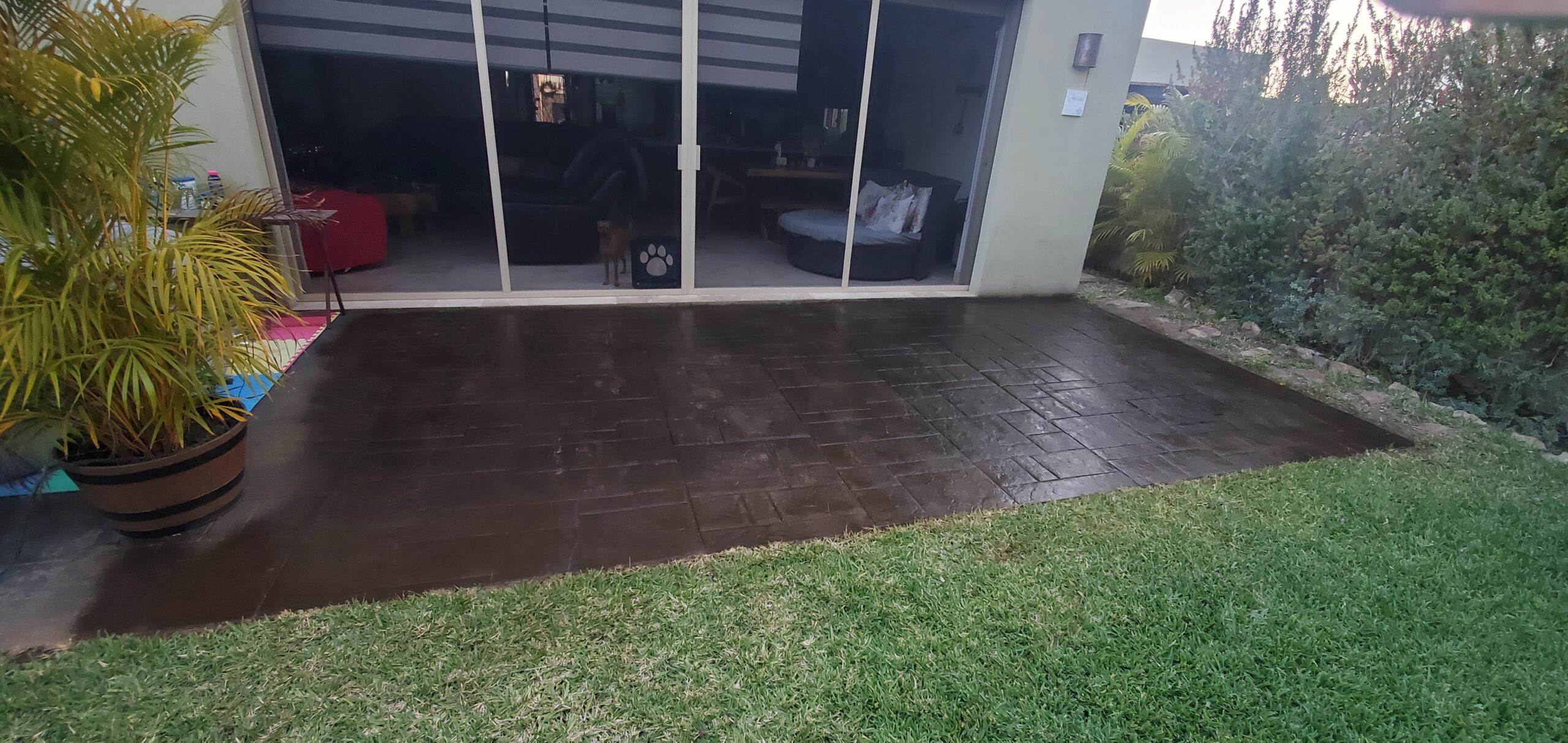 Aztec Brown Antiquing Stain on Stamped Concrete Patio