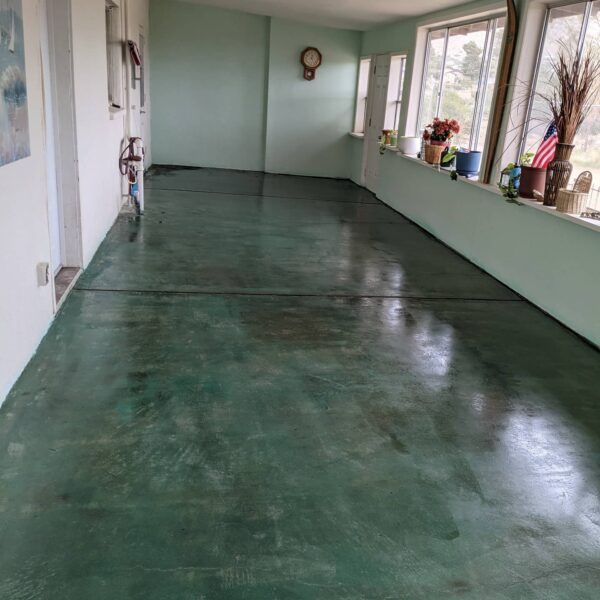 Sunroom concrete floor stained with Emerald Green and Black Forest ColorWave