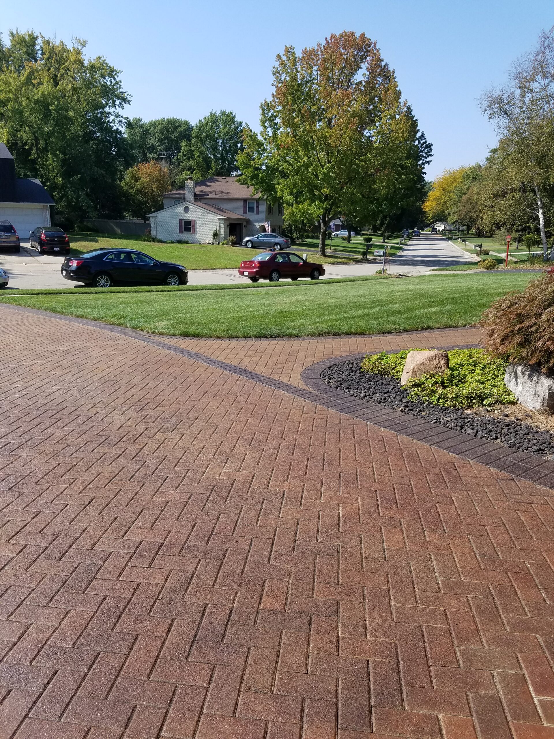 Crimson and black Portico stained paver driveway