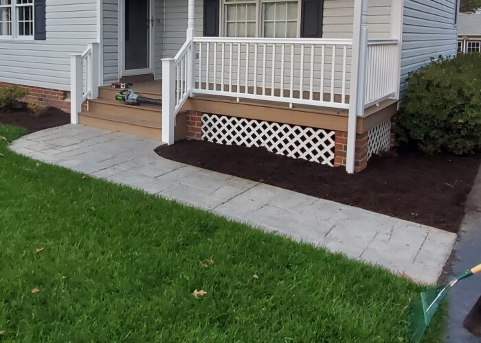 20-year-old stamped concrete sidewalk before renovation