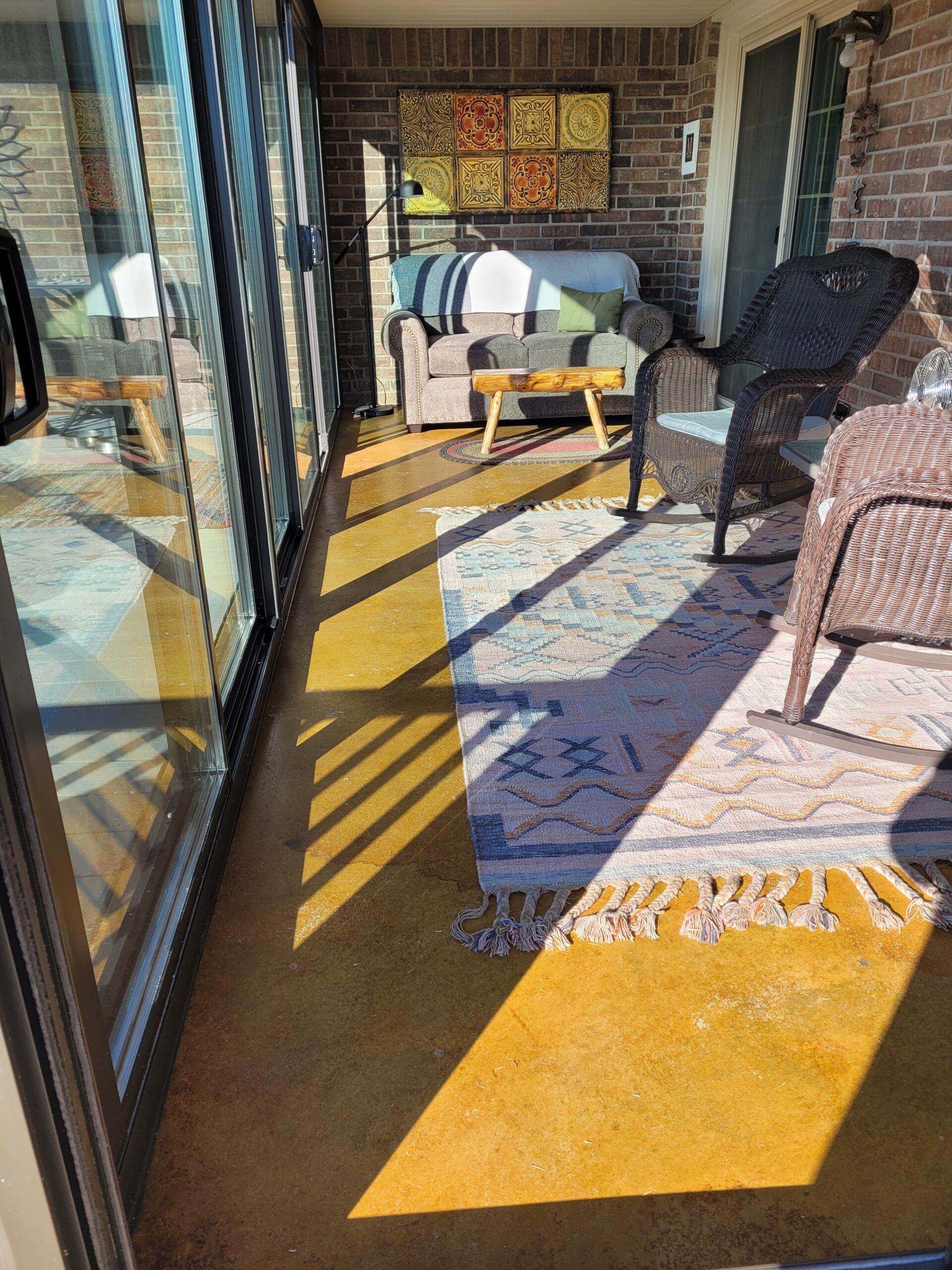 Sunroom concrete floor stained with Colorwave water-based gold stain