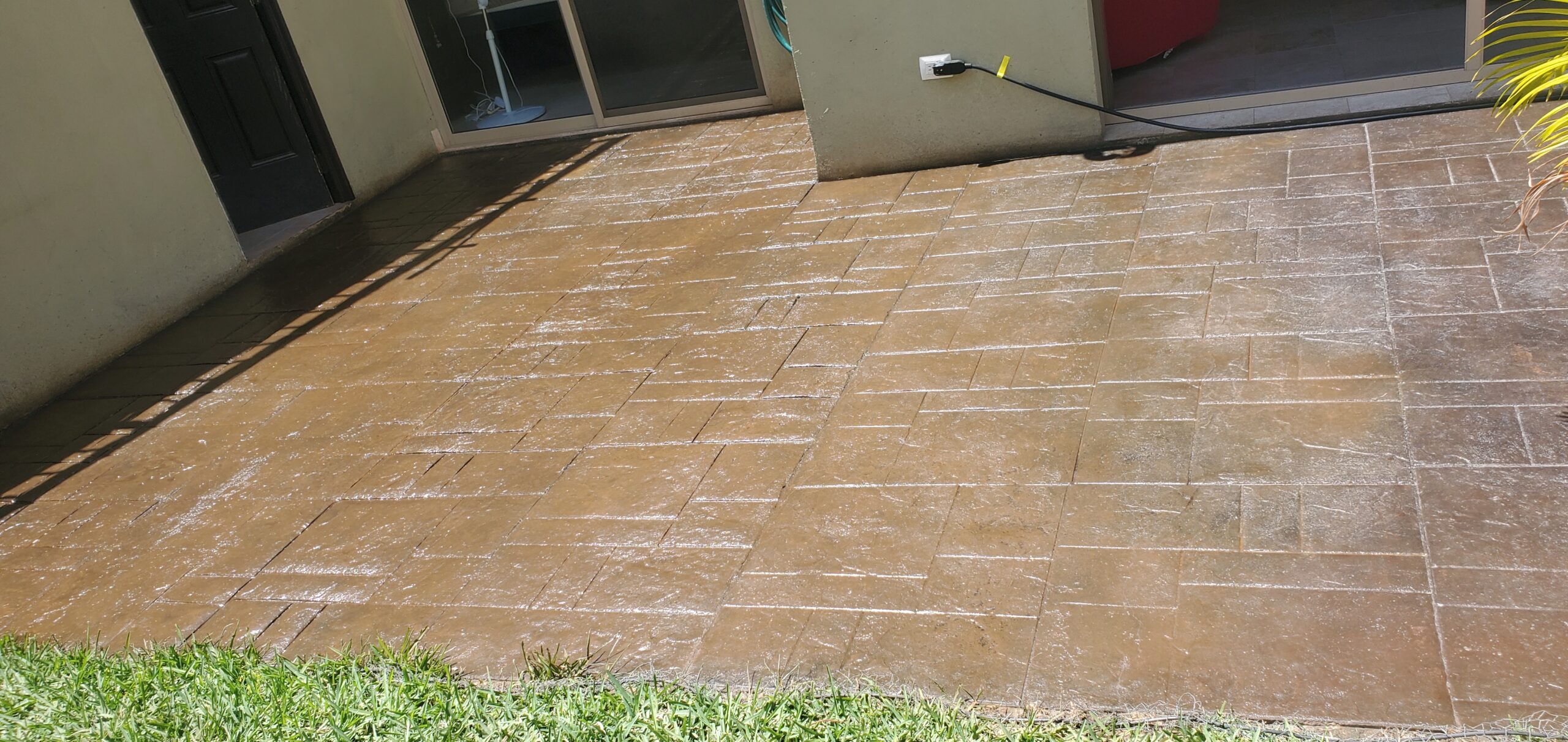 A beautifully finished patio stained with Tweed, Cafe Royale, and Aztec Brown Antiquing stains