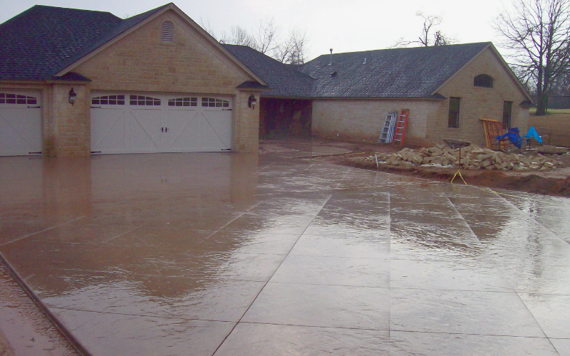 Scored concrete driveway stained with sunset tan EasyTint gloss