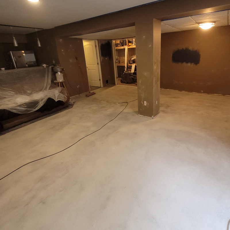 Concrete overlay on basement floor