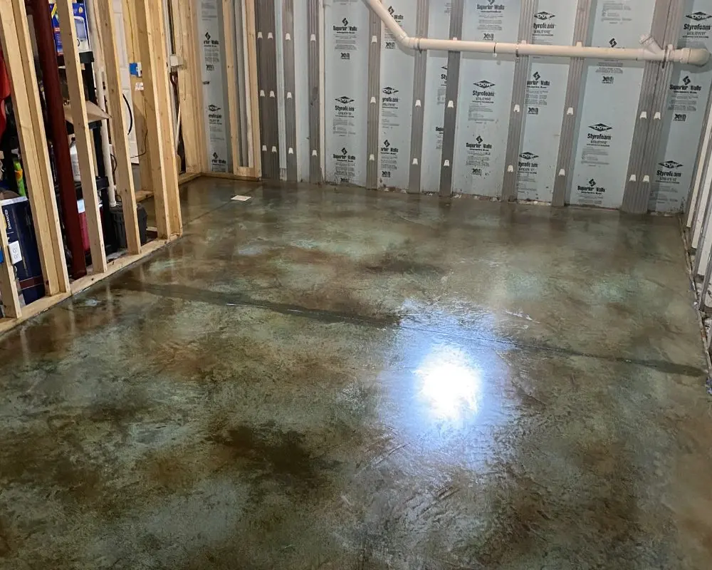 Sealed concrete floor with the Azure Blue and Coffee Brown colors vibrant and popping