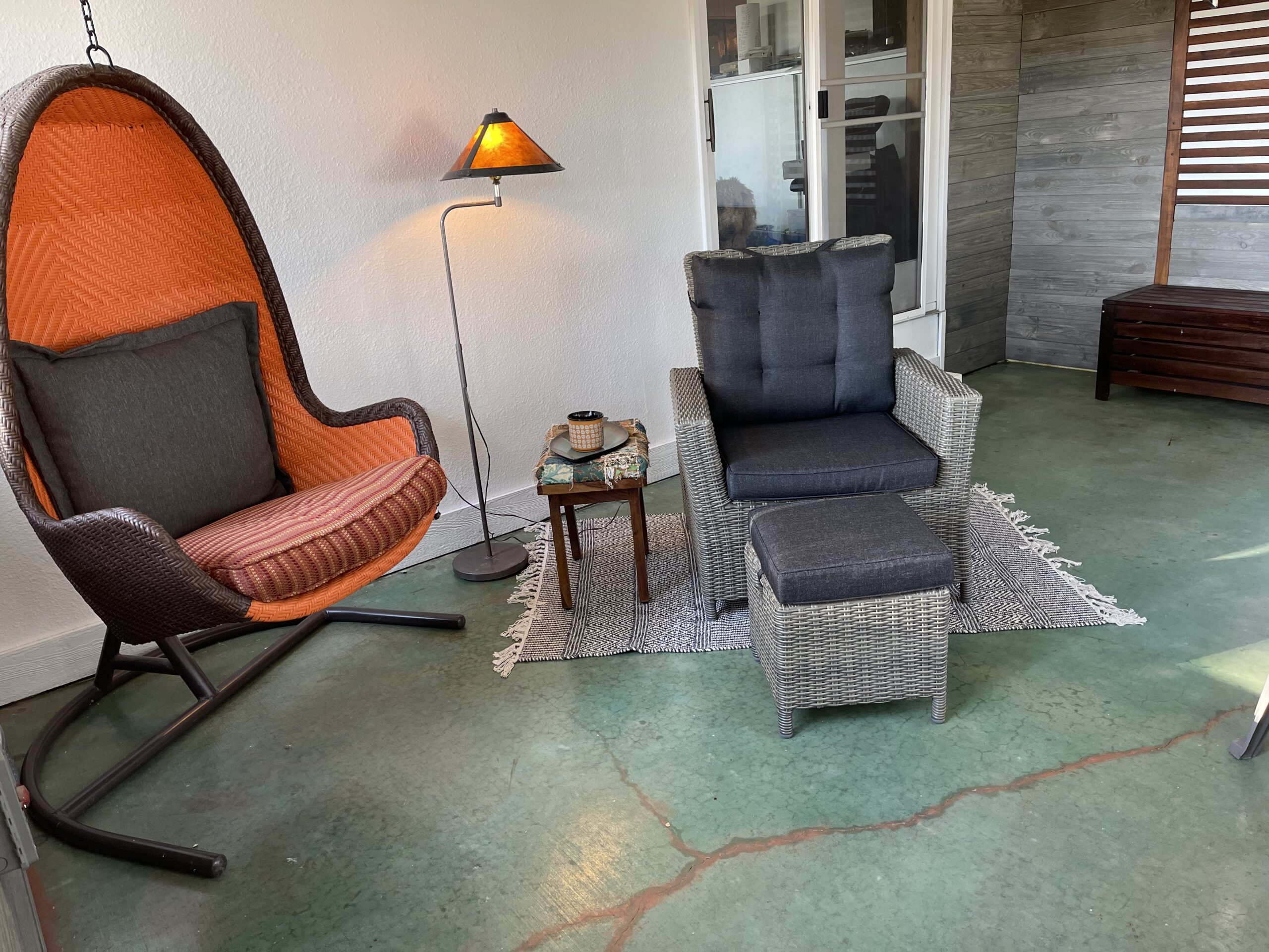 Finished sunroom floor showing azure blue stain, sealer, and acrylic paint veining accents