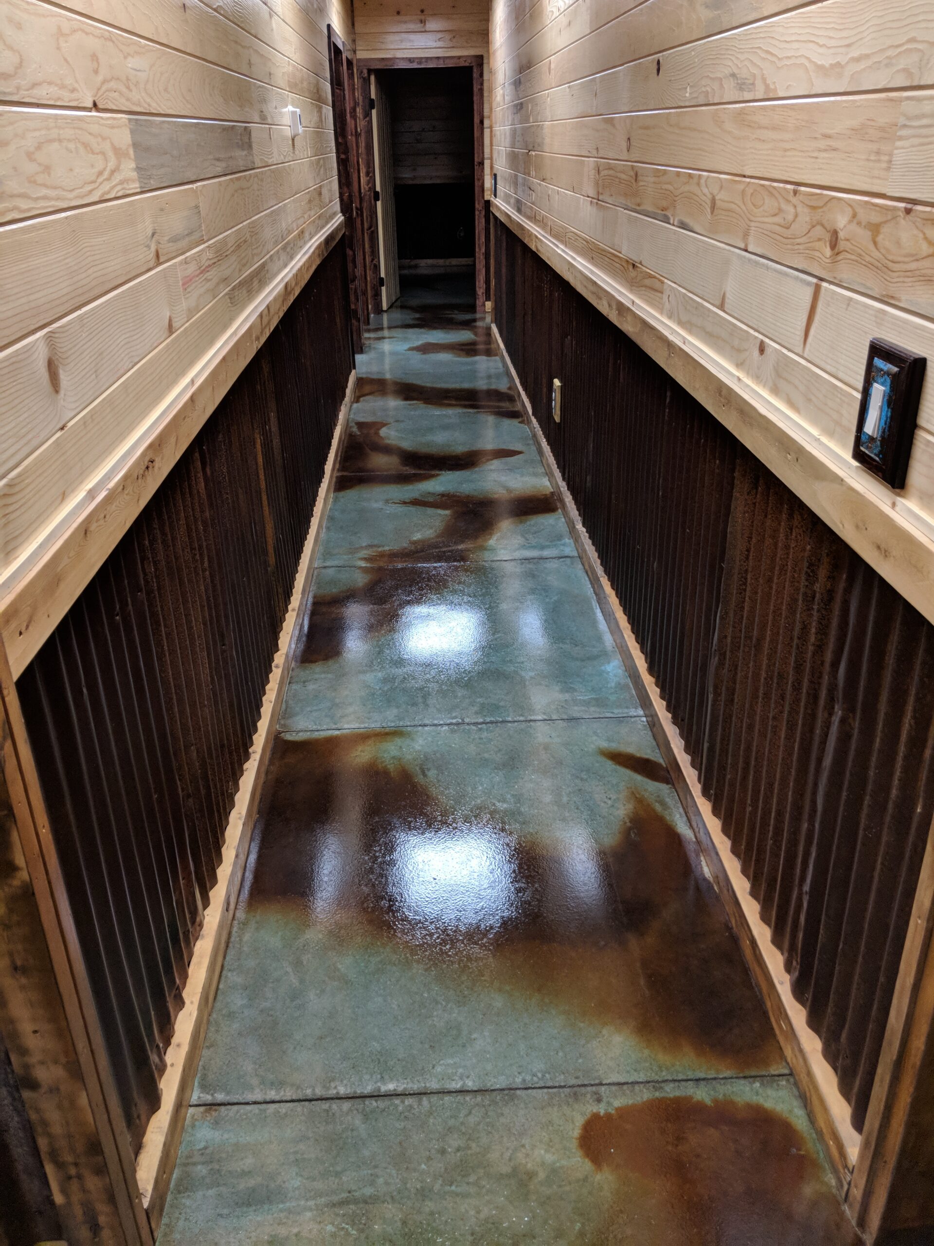 Acid stained barndominium office concrete floor