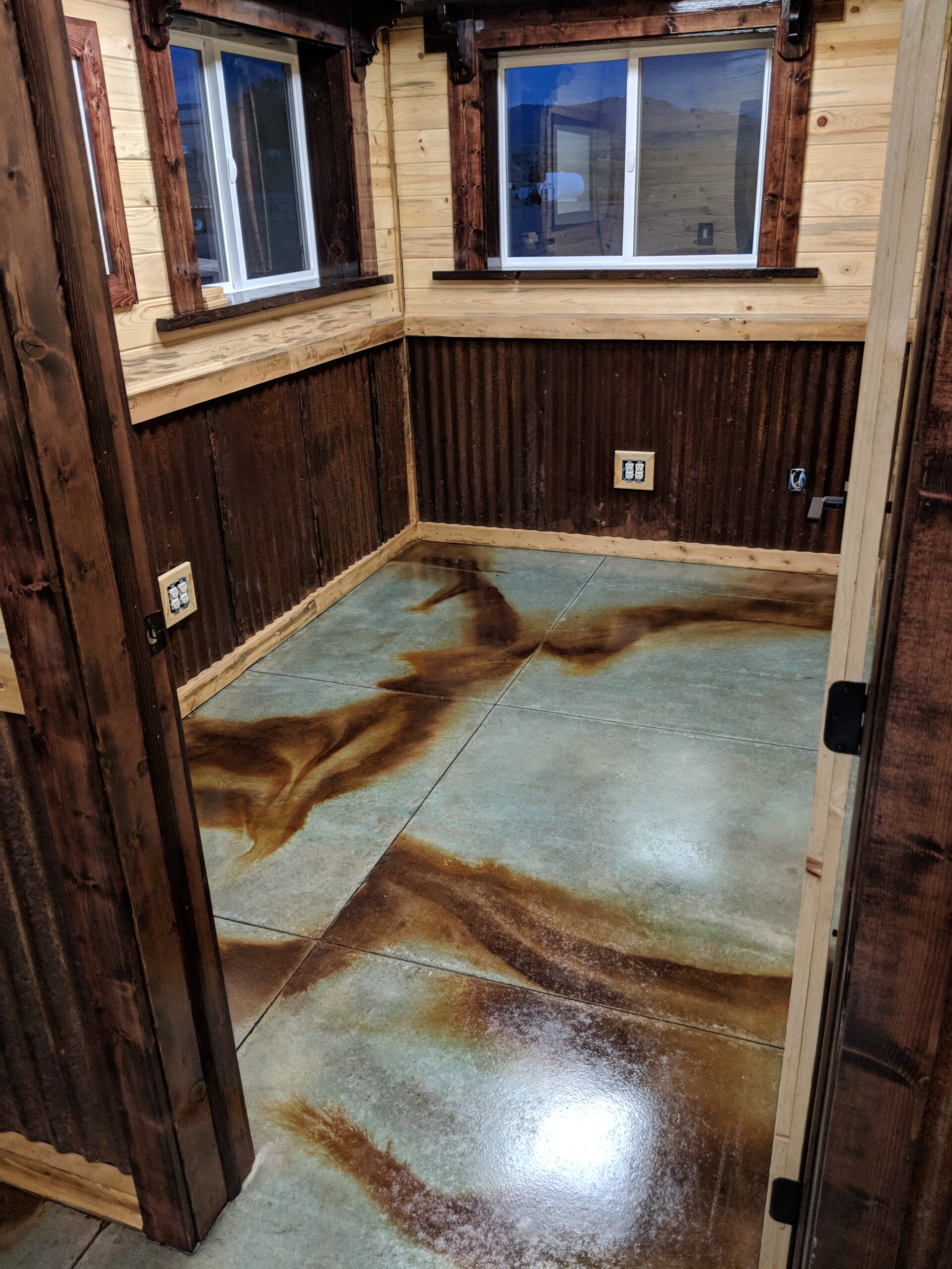 Acid stained barndominium office concrete floor