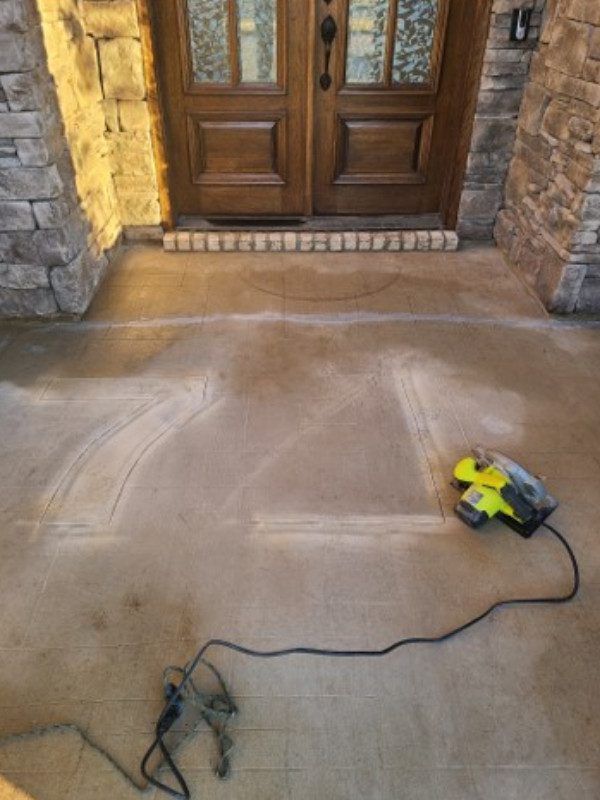 grinding stencil on concrete floor