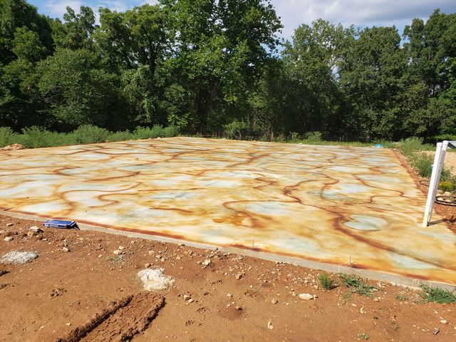 Acid stains applied using a concrete veining technique