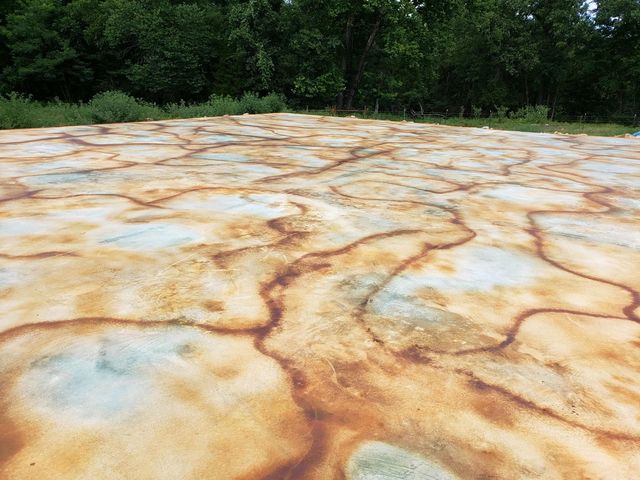 Veined acid stained barndominium concrete floor