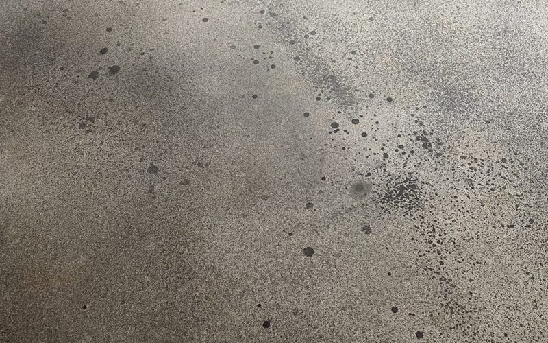 Uneven, spots or inconsistent areas on concrete surface due to malfunctioning sprayer