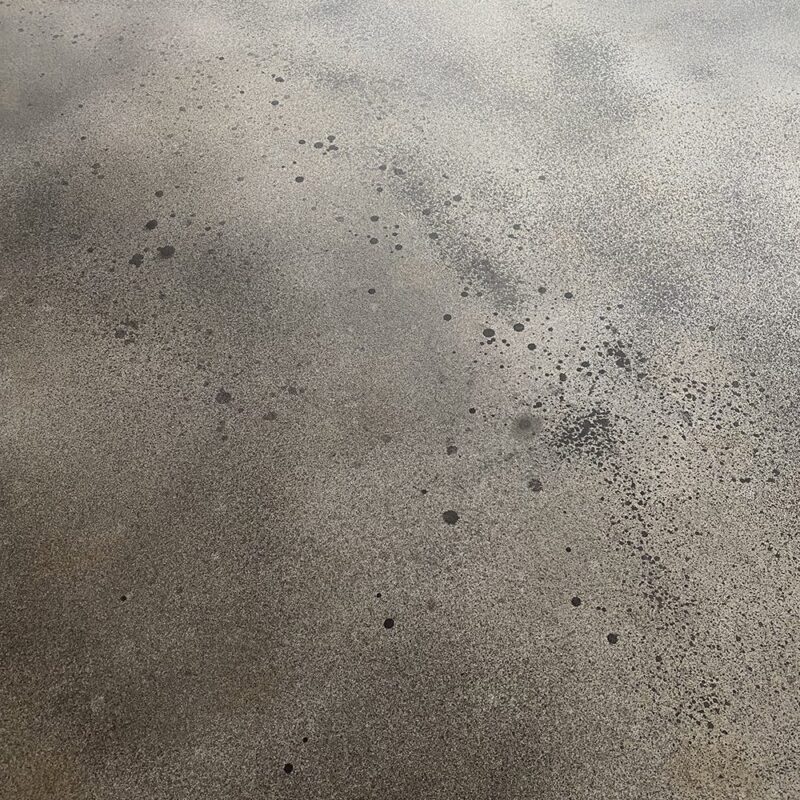 Uneven, spots or inconsistent areas on concrete surface due to malfunctioning sprayer