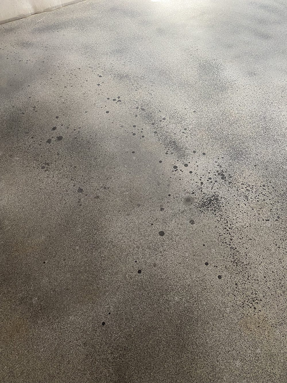 Uneven, spots or inconsistent areas on concrete surface due to malfunctioning sprayer