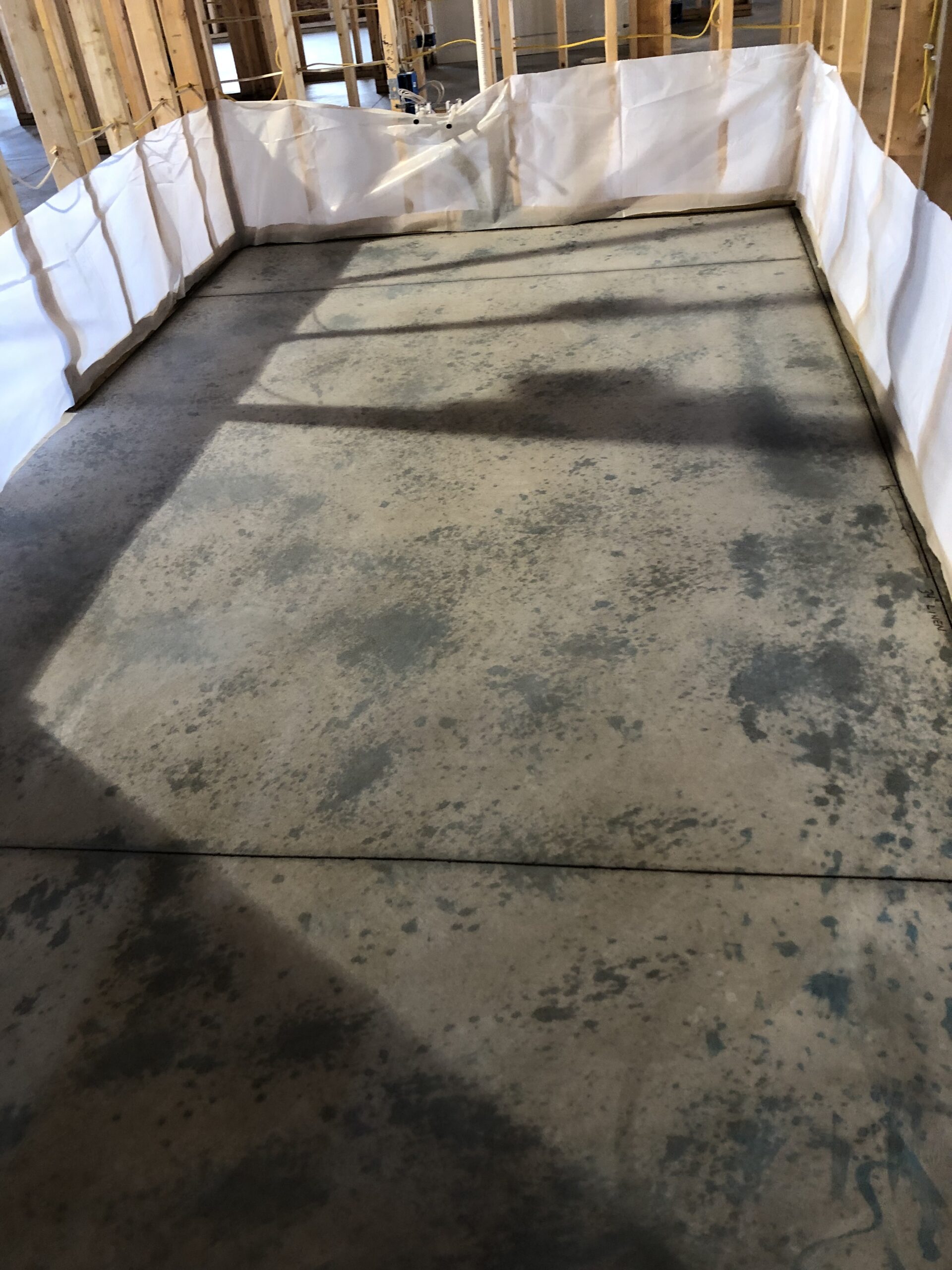 Dry Blue ColorWave Stains Over White on Concrete Floor Dry Blue ColorWave Stains Over White on Concrete Floor