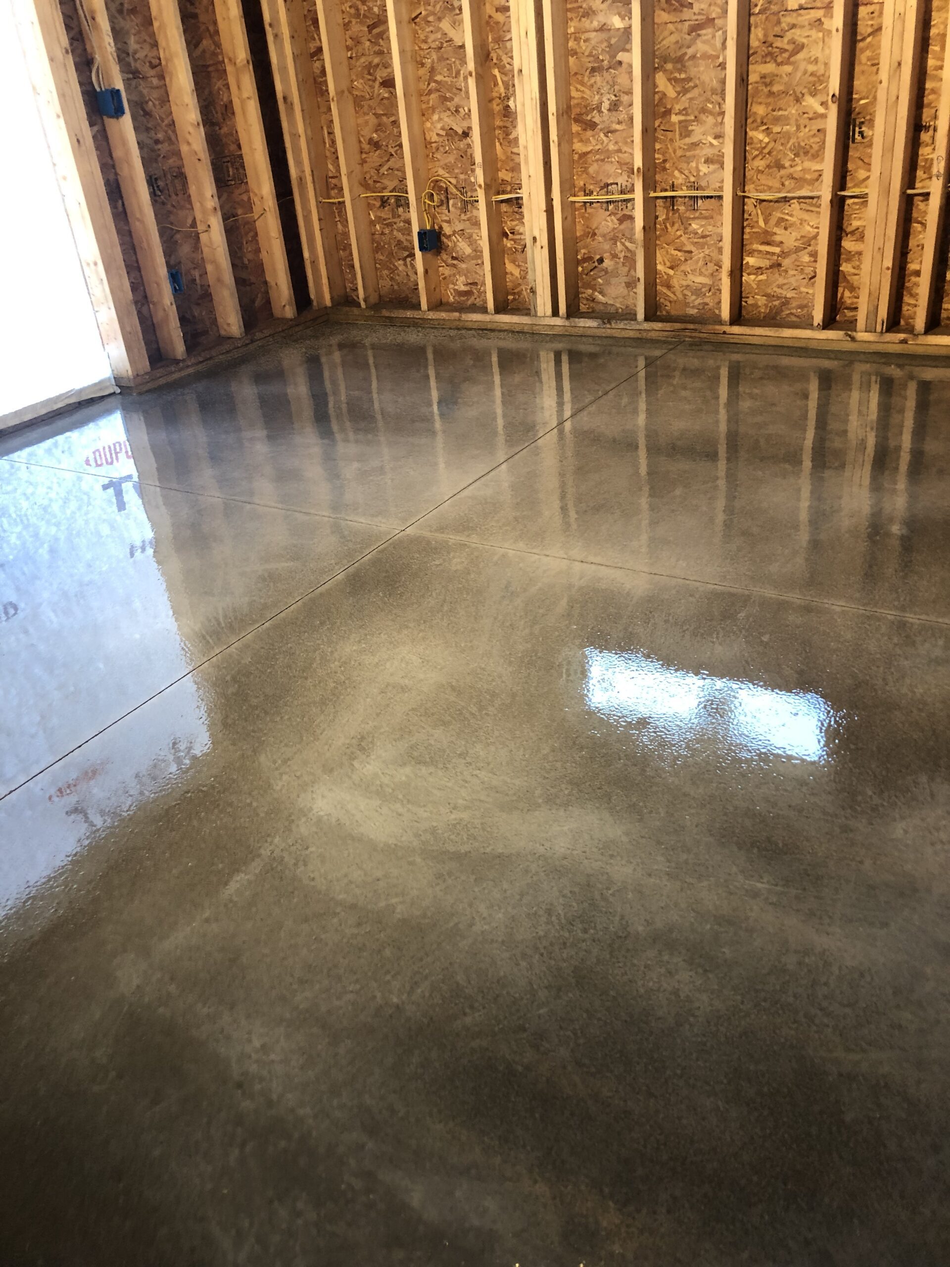Concrete Floor After First Coat of Sealer (Still Wet)
