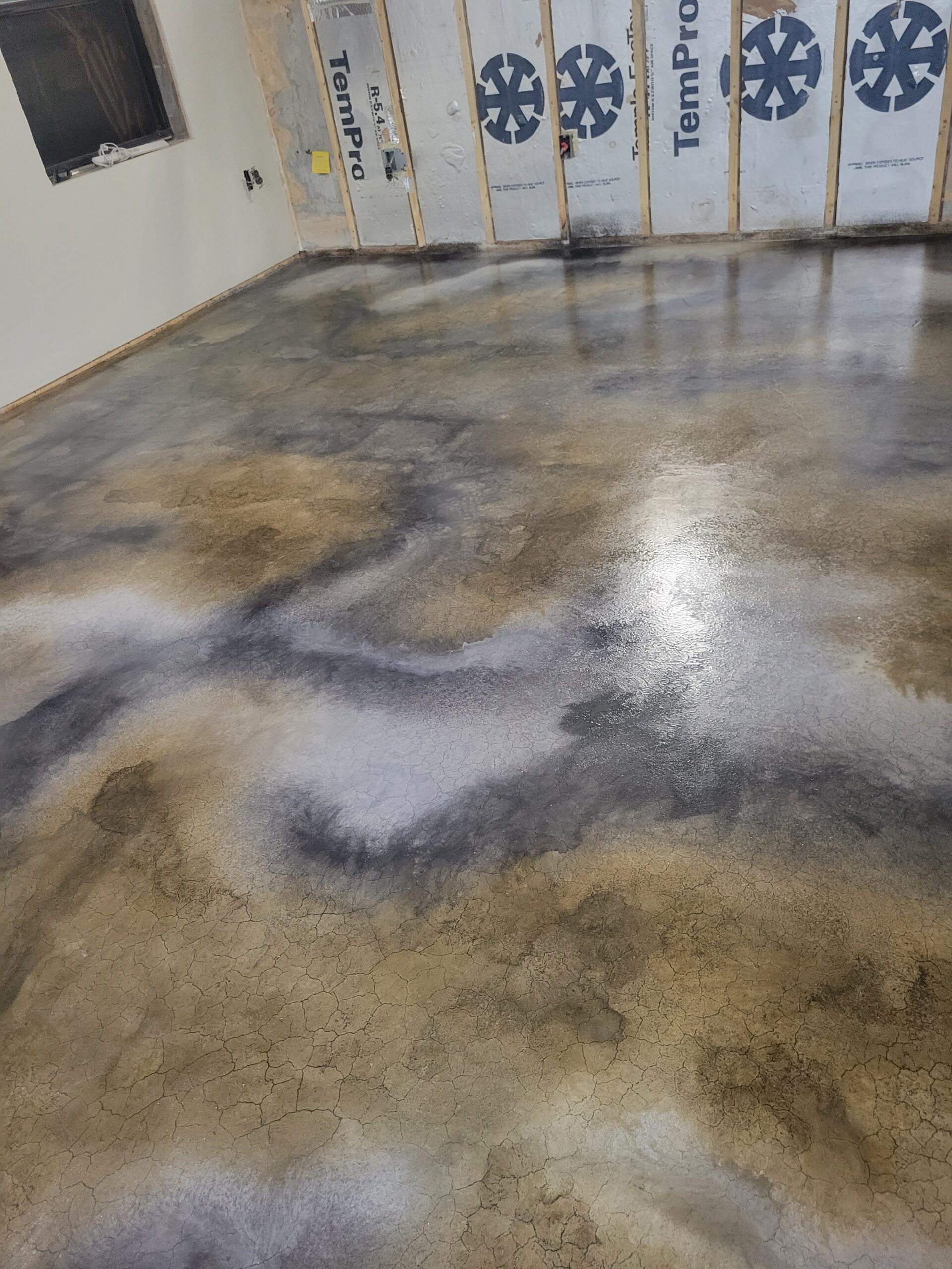Iron Gray, Silver, Stone Gray, and White ColorWave Sealed with One Coat of EasySeal on Concrete Floor