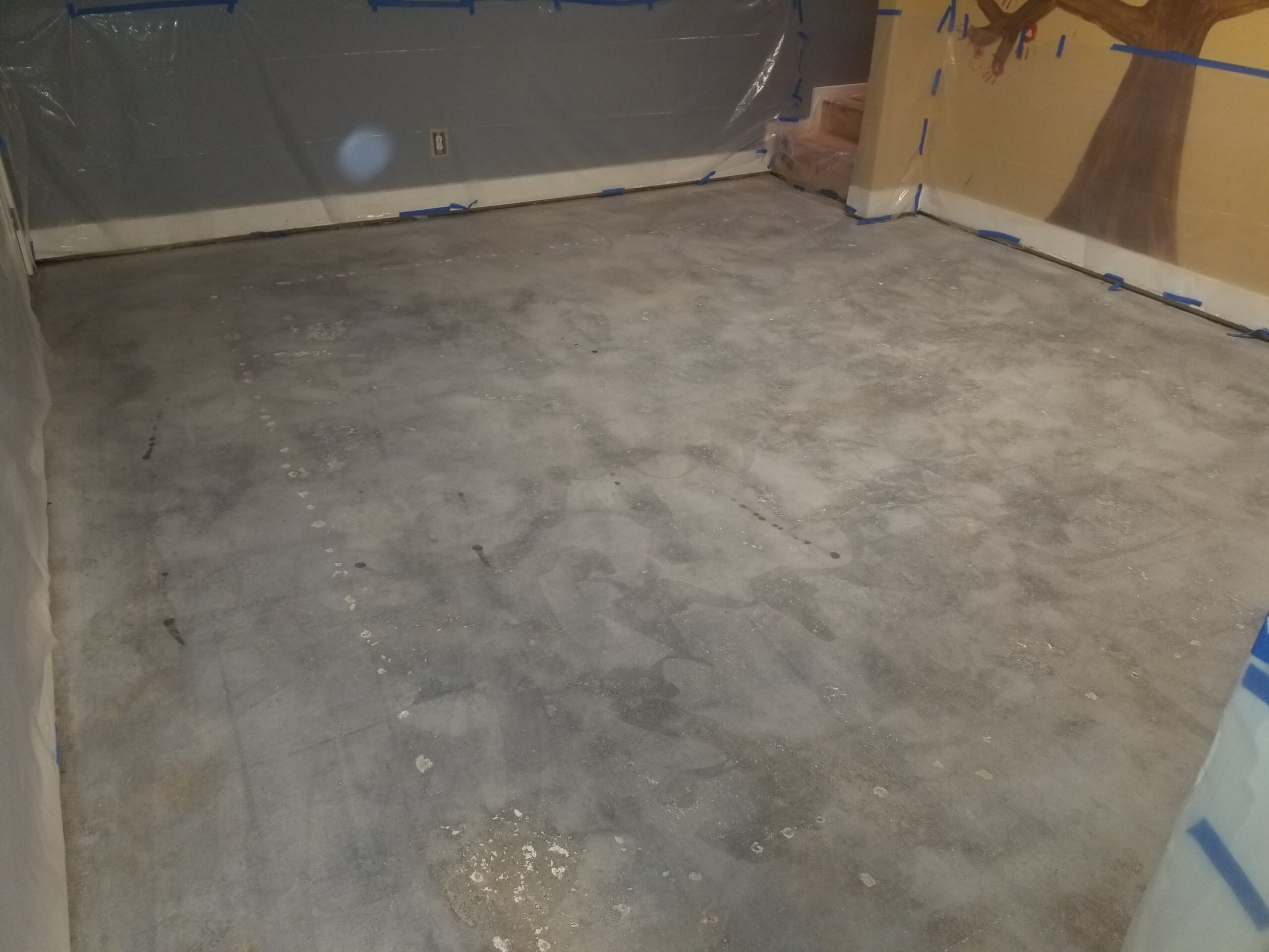 Plain concrete flooring in a Pre-K classroom