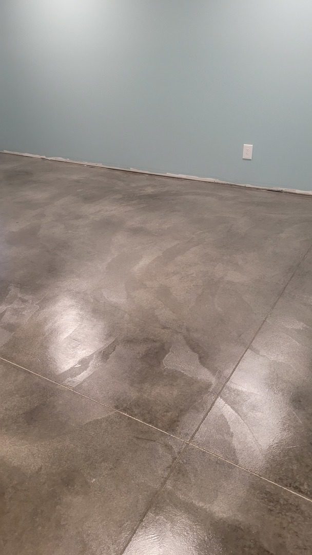 Steel gray ColorWave stained concrete basement