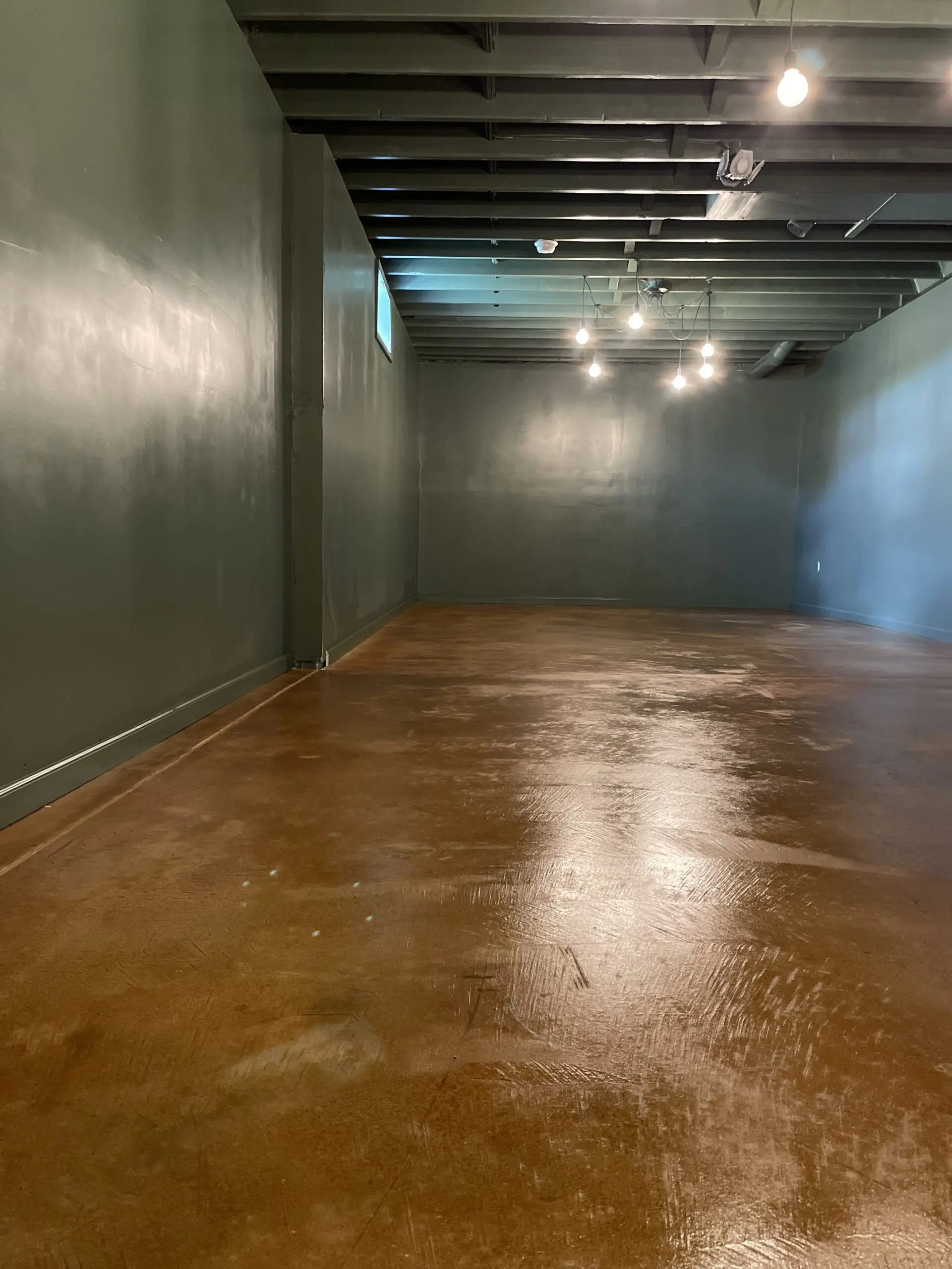 Image of the concrete floor after application of Malayan Buff and sealer