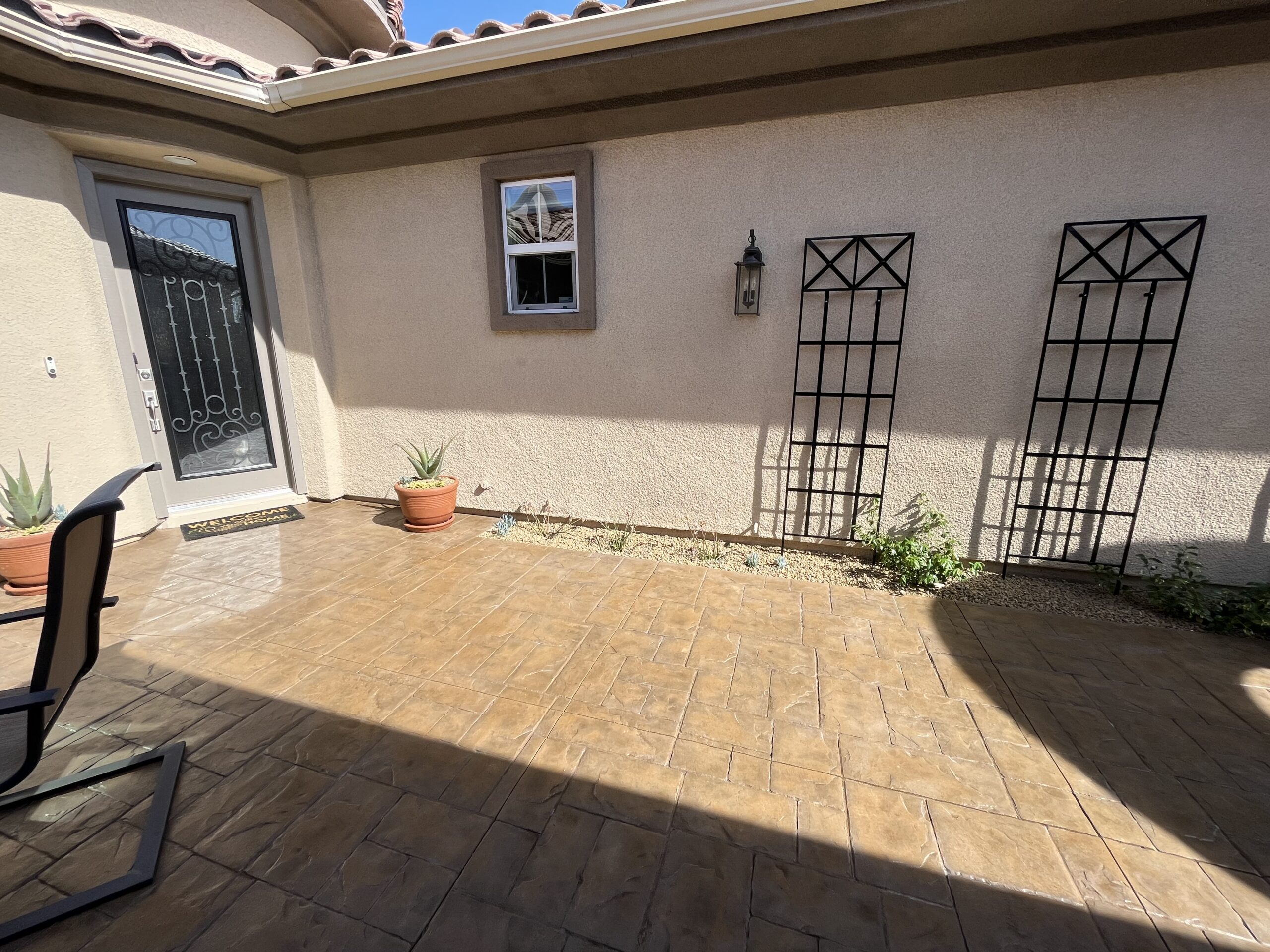 The newly revitalized courtyard, now stained with Tweed Antiquing Stain