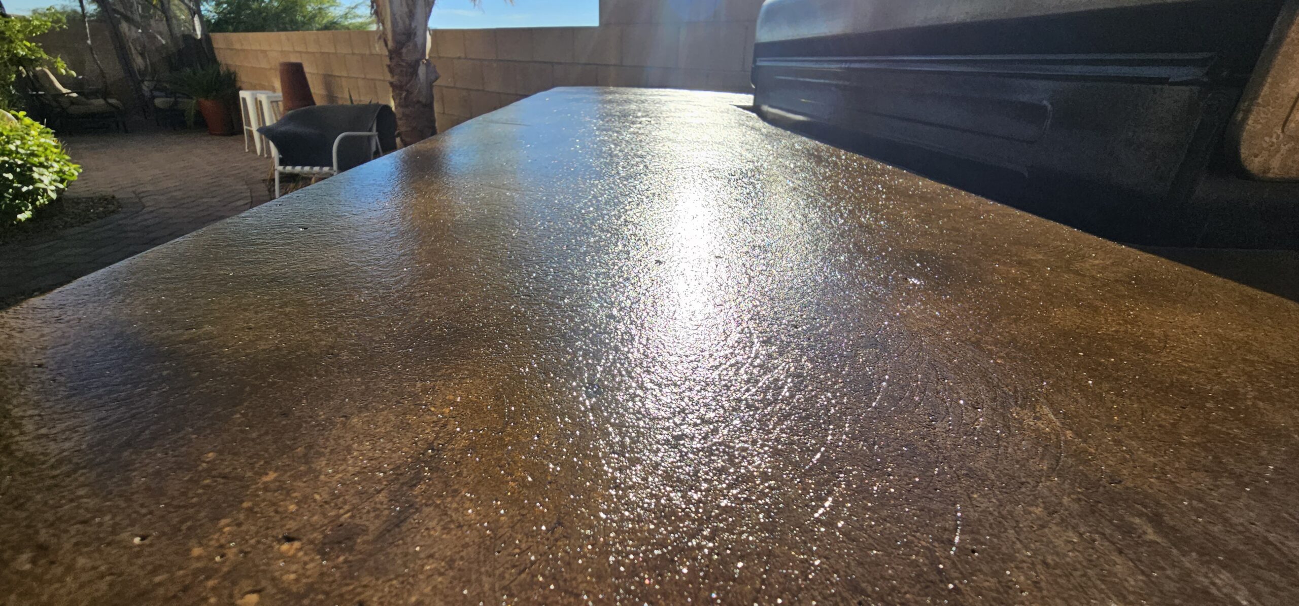 Finished countertop with a glossy marbled look using Cumin and Aztec brown stains.