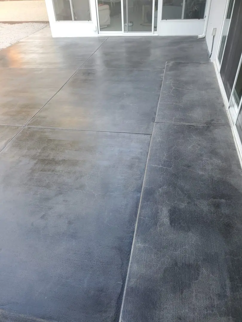 Finished stained and sealed concrete patio, radiating in its sleek elegance Antiquing Black
