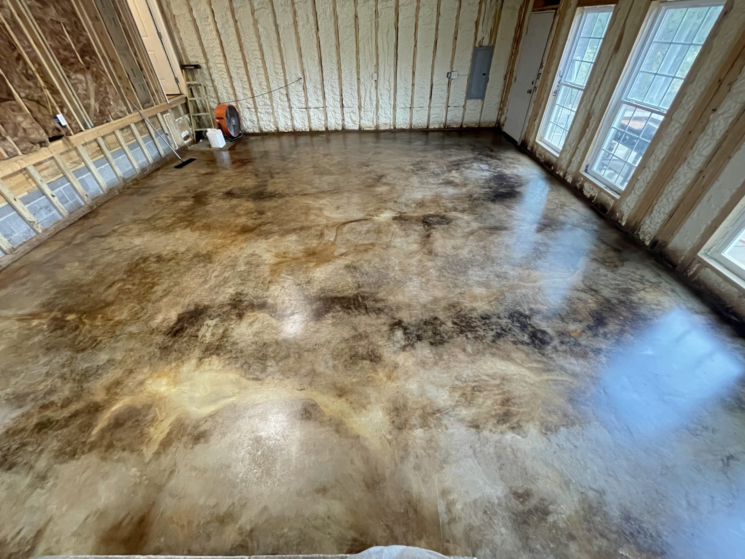 A finished living room floor with EverStain Black and Coffee Brown stains and a final wax application for a subtle, polished finish.