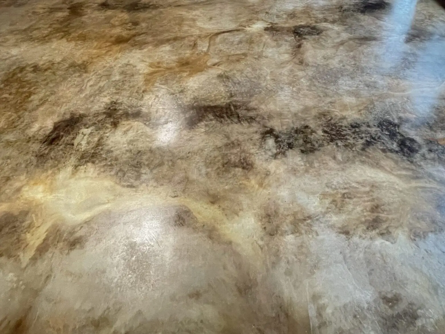 leather-like finish concrete floor with EverStain Coffee Brown and Black acid stains