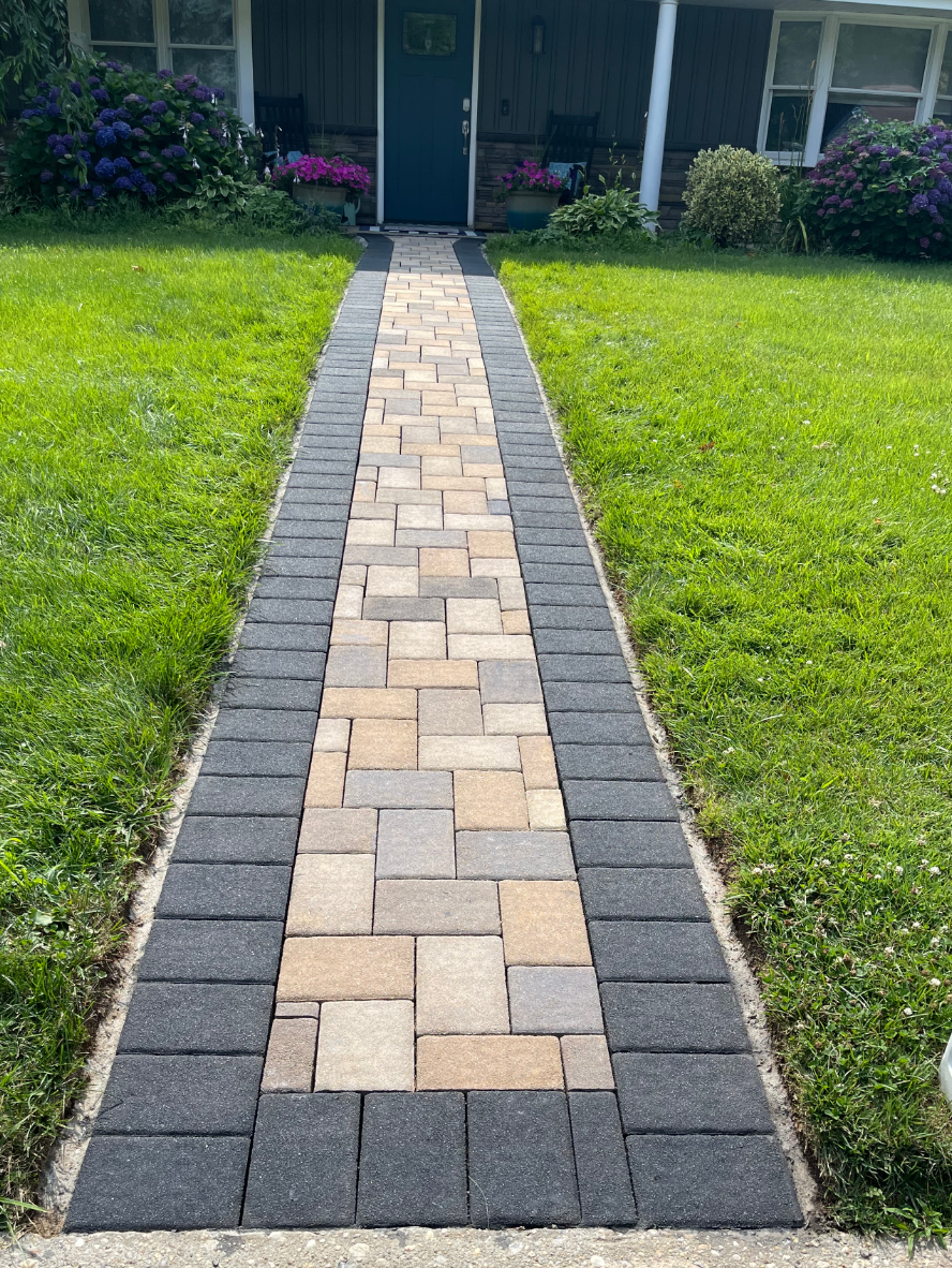 restored-paver-walkway-portico-buff-charcoal-khaki-silver-gray-stains After renovation: Revitalized paver walkway stained with a blend of Buff, Charcoal, Khaki, and Silver Gray