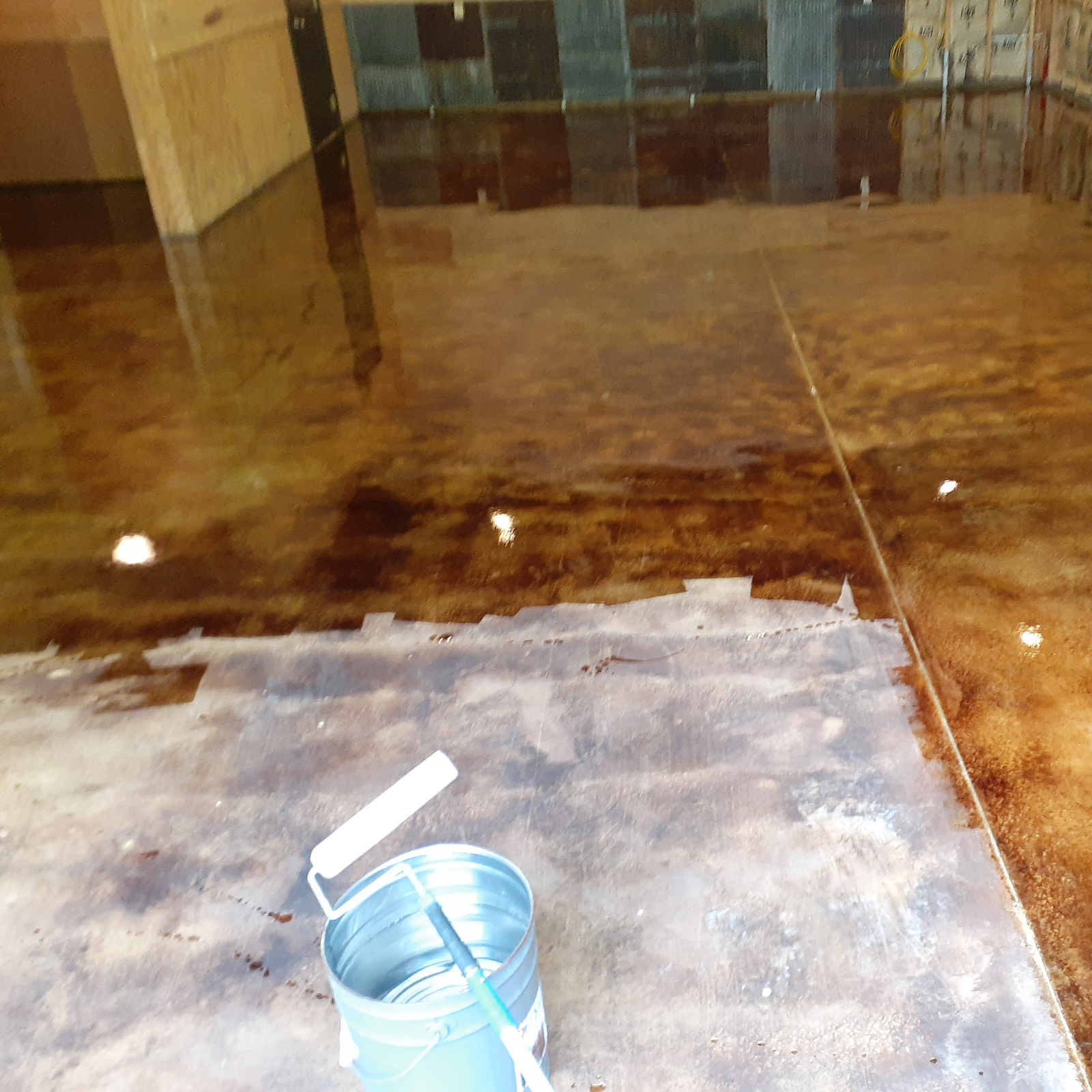 Application of EasySeal on Coffee Brown stained concrete garage floor