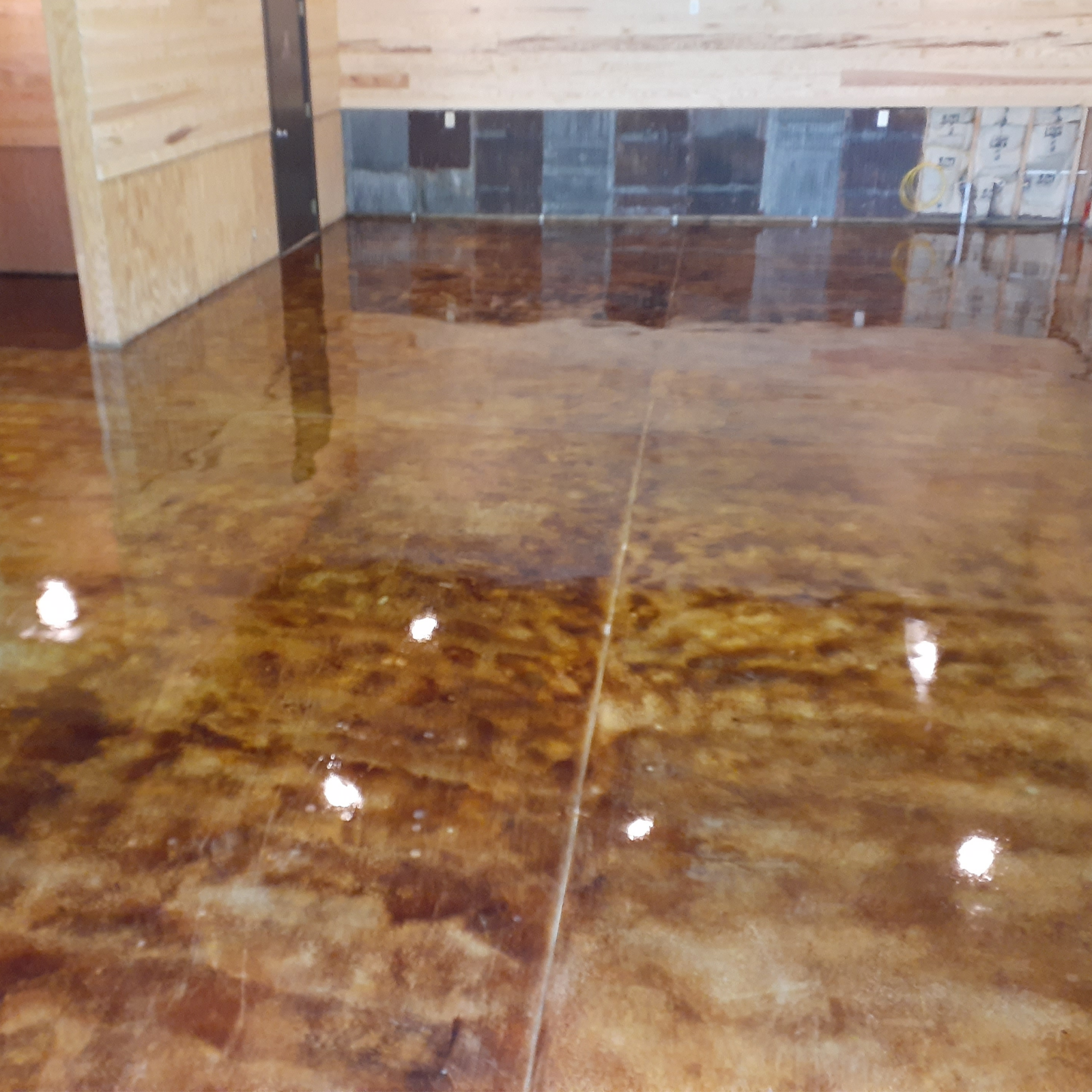 Concrete garage floor after neutralizing and rinsing Coffee Brown EverStain acid stain