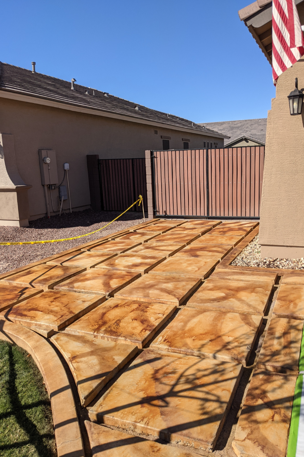 Initial staining of the driveway with Malayan Buff EverStain