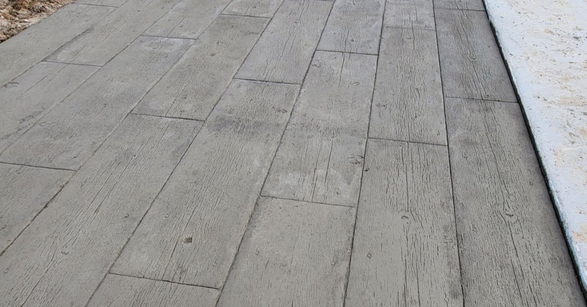 Stamped concrete patio with a wood plank pattern