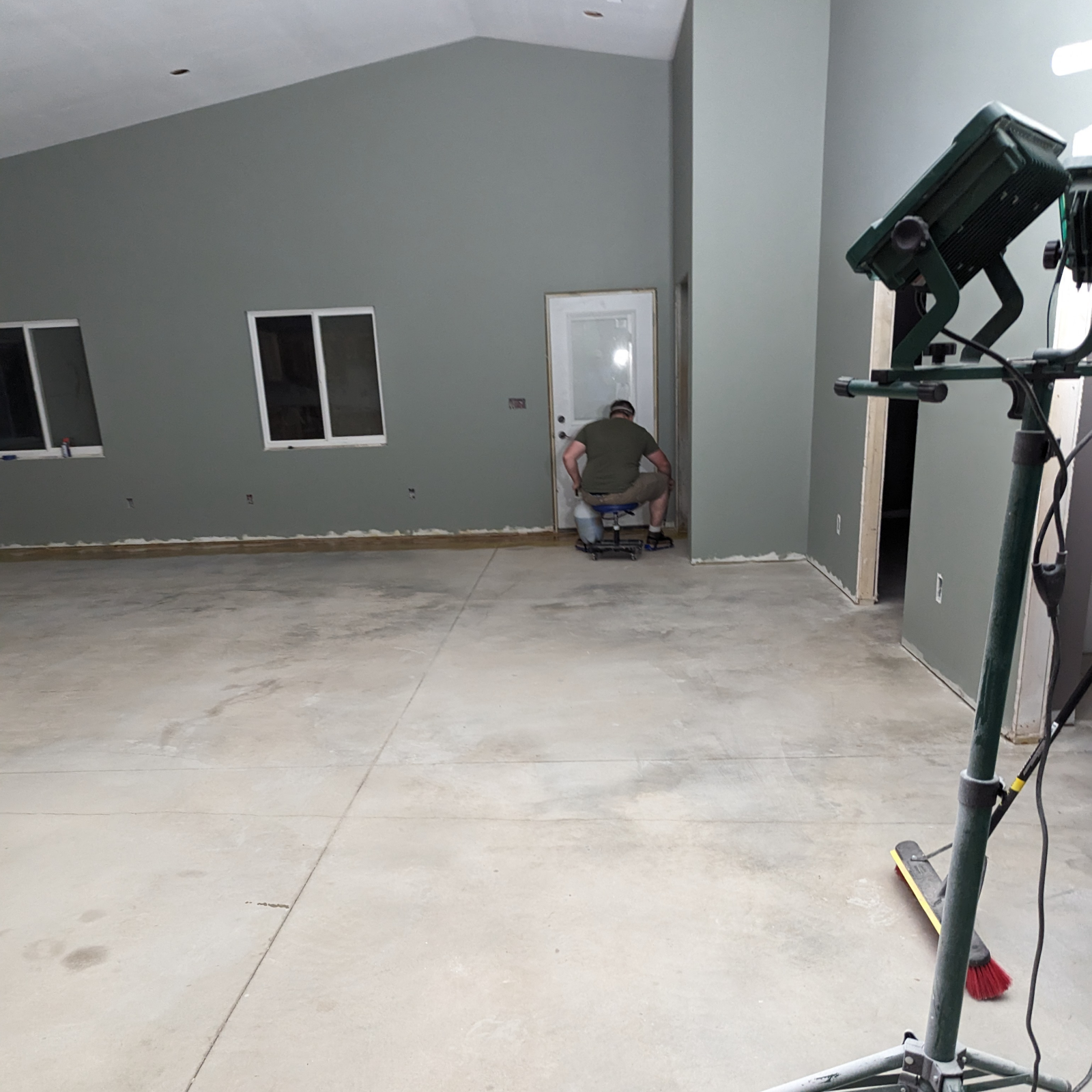 New shed house with plain concrete floors before staining