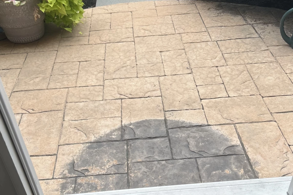 Faded and discolored stamped concrete porch before restoration aztec-chocolate-cinnabar Faded and discolored stamped concrete porch before restoration