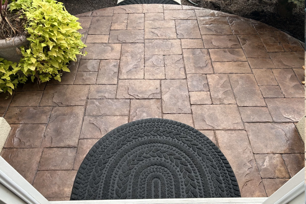 Restored stamped concrete front porch colored with Aztec Brown, Chocolate, Buff, and Cinnabar Antiquing Restored stamped concrete front porch colored with Aztec Brown, Chocolate, Buff, and Cinnabar Antiquing™ Stains, sealed to a smooth satin finish.
