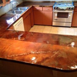 Smooth White Overlay with Shifting Sand, Cola and Coffee Brown Acid Stains Sealed with 100% Epoxy Countertop Sealer Acid Stained Overlay Countertop