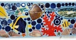 15.4 Blue Concrete Pigment in Grout Close Up of Fish Backsplash with Integrally-Colored Grout