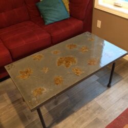 Concrete coffee table stained with Desert Amber Acid Stain Sealed with Polyurethane Countertop Sealer Acid Stained Concrete Coffee Table