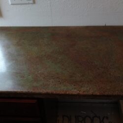 Concrete countertop stained with Avocado, Desert Amber and Coffee Brown Acid Stained Sealed with Penetrating Concrete Sealer and Natural Wax Acid Stained Kitchen Countertop