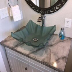 Bathroom Vanity with Pearl and Whale Metallic Pigment Accents on a Gray Tinted Concrete Sealer Base Color Metallic Epoxy Bathroom Vanity
