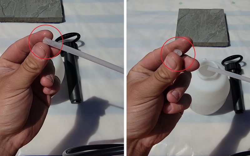 Hand showing filter removal from a pump-up sprayer